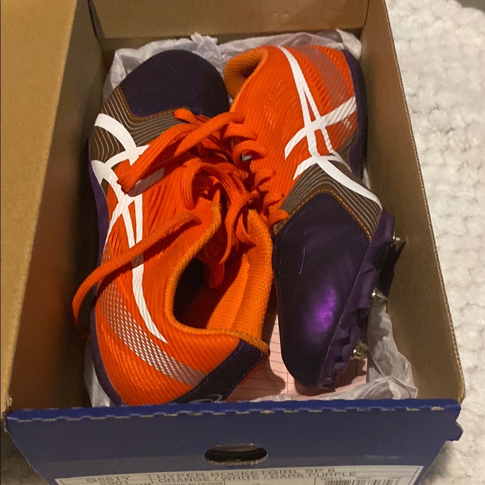 ASICS women’s Orange and Purple Sports spikes track Shoes